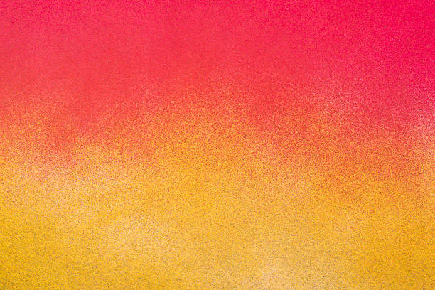 istock Red and yellow spray paint background 2254325000