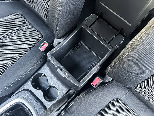 istock Inside a modern vehicle showing spacious center console and cup holders designed for convenience and comfort during travel 2254328844