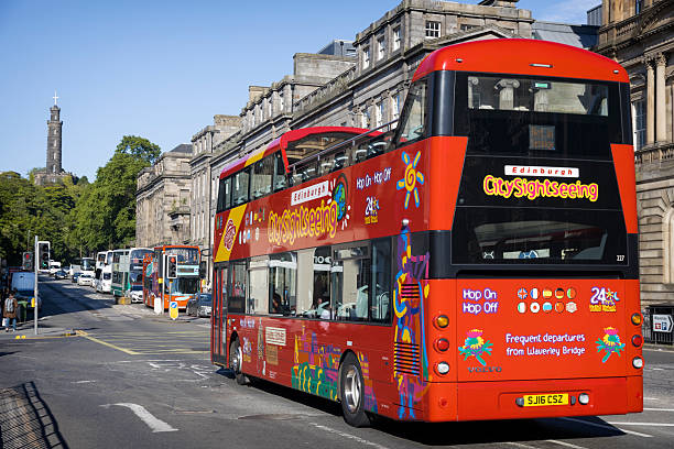 Holidays in Scotland - Sightseeing Bus in Princes street in Edinburgh. The street is one of the main arteries of the Old Town in Edinburgh