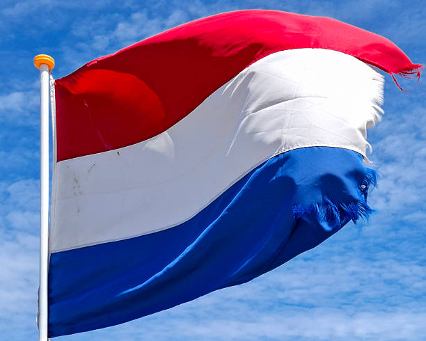 istock Dutch flag in red, white, and blue waving in the wind 2254331501