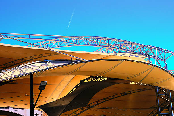istock blue and grey roof with a blue sky 2254331756