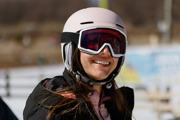 istock Smiling Female Skier Posing at ski resort 2254332122