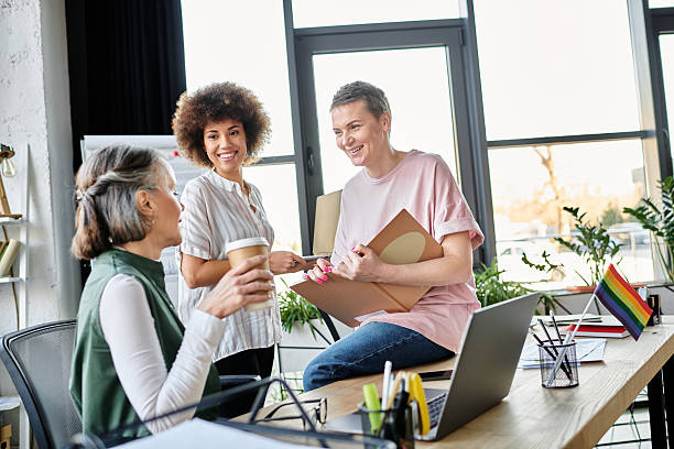 istock Women collaborating in a bright office space while sharing ideas and laughter 2254334455