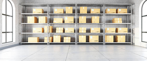 istock Industrial Storage Racks with Cardboard Boxes in a Modern Warehouse 2254337420