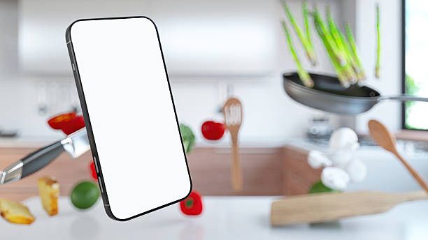Smartphone with Blank White Screen Flying in a Modern Kitchen