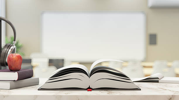 Open Book on a Desk in a Modern Blurred Classroom. 3D Render