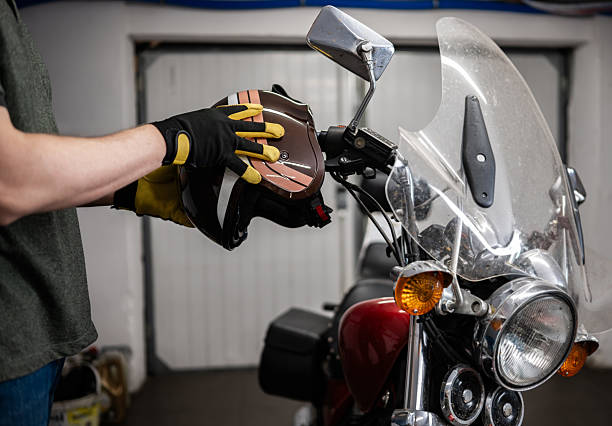 istock Man Wearing Protective Moto Helmet 2254338069