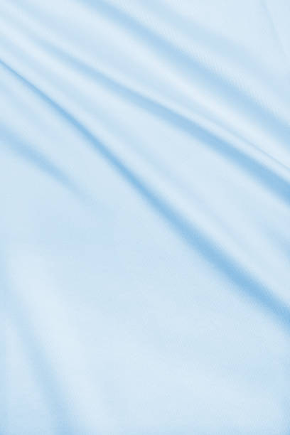 istock Smooth elegant blue silk or satin luxury cloth texture as abstract background. Luxurious background design 2254338730