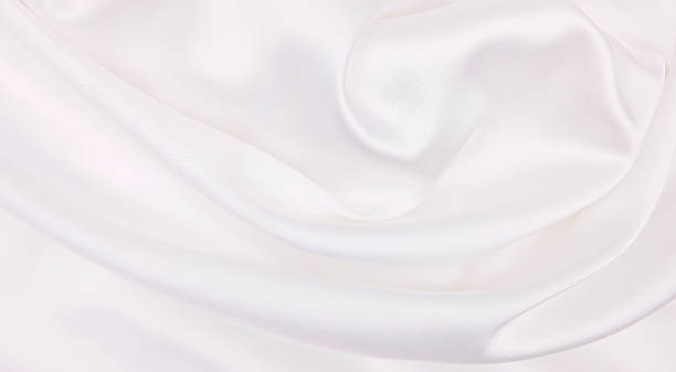 istock Smooth elegant white silk or satin luxury cloth texture as wedding background. Luxurious Christmas background or New Year background design 2254338731
