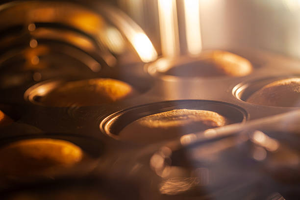 It captures the heartwarming moment of a pound cake gradually rising and browning under the high temperature of the oven.