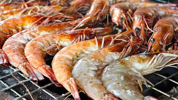 Grilled shrimp on charcoal stove.