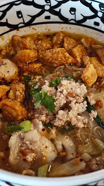 istock Thai Tom Yum Noodles with Crispy Pork. 2254344080