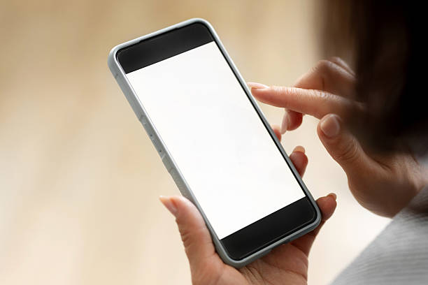 istock Girl Holding Smartphone With White Screen 2254346986