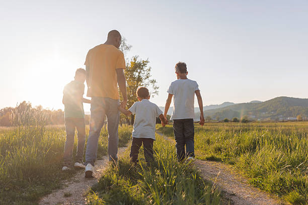 istock Walking together in the evening light 2254347078