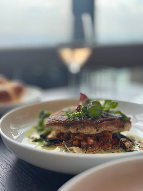 istock Gourmet Seared Fish Fillet with Ratatouille and Microgreens 2254349840