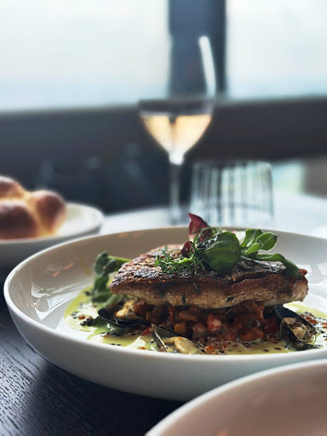 istock Gourmet Seared Fish Fillet with Ratatouille and Microgreens 2254349849