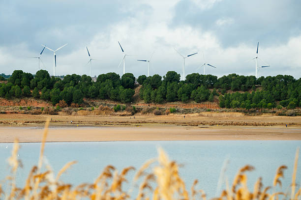 istock Wind Turbines Near Reservoir 2254362615