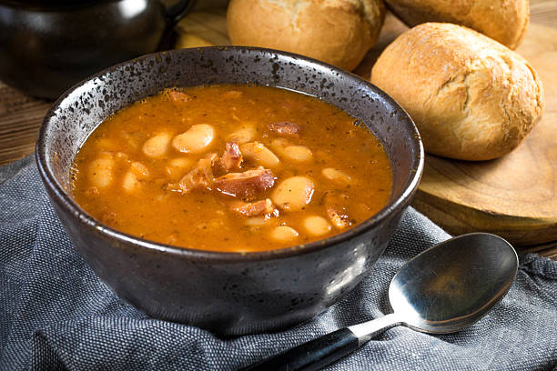 istock Beans with tomato sauce, bacon and sausage. 2254365092