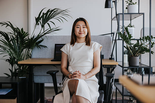 istock Confident professional woman in a modern office setting 2254367172