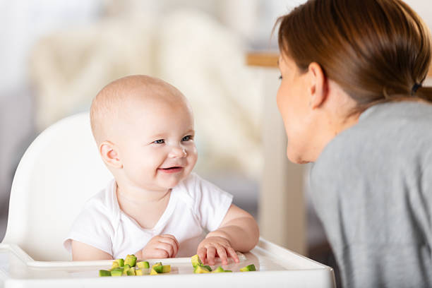 Baby eating baby food