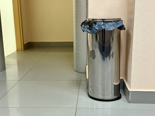 istock Contemporary Stainless Steel Trash Bin, Polished Chrome Waste Container Situated In Corridor Setting, Refined Stainless Steel Waste Disposal Unit With Liner In Hallway Environment 2254369523