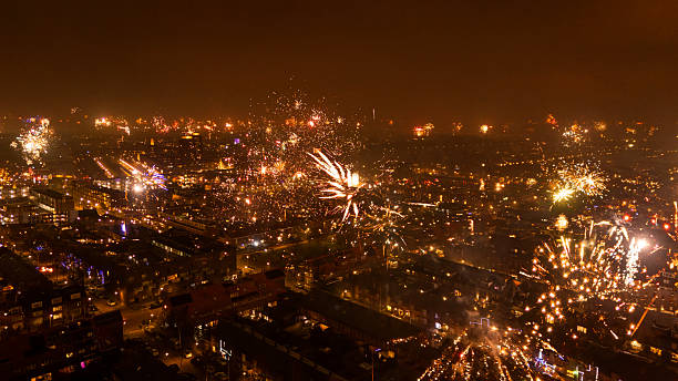 Fireworks behind the high-rise buildings on Brickell Key, a man-made island in Downtown Miami, Florida. Brickell Key Island is triangular in shape and comprises 44 acres of land. The island has now been developed with luxury high-rise apartments and condominiums.