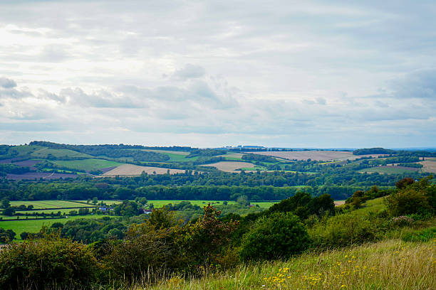istock Views over English countryside with rolling hills 2254373877