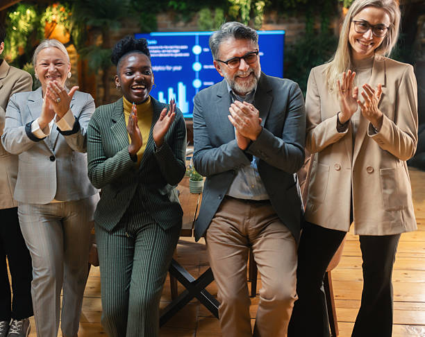 istock Business people applauding during successful meeting 2254374506