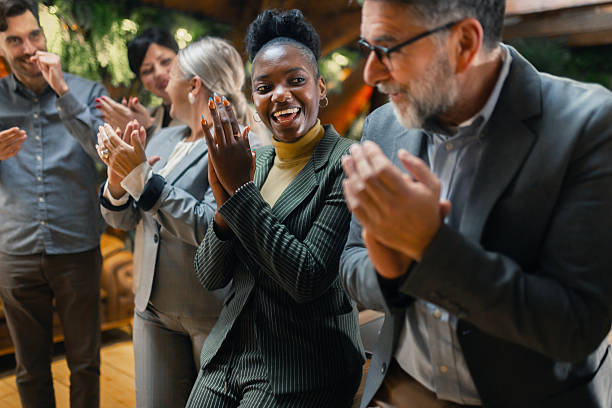 istock Business people applauding during successful meeting 2254374516