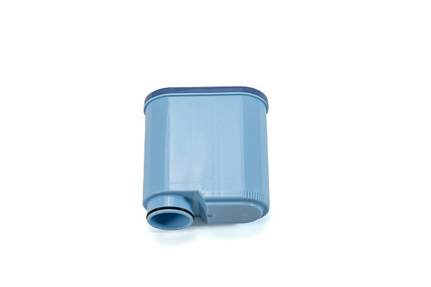 istock Side view of blue plastic water filter cartridge isolated on white. 2254379148