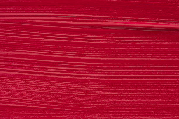 Macro texture of red acrylic glossy paint