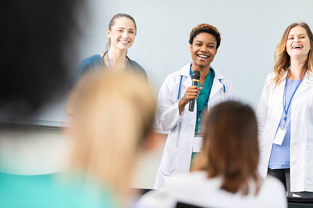 istock Doctors smiling and presenting at a medical conference or educational event. 2254383638