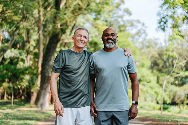 istock Portrait Elderly friends walking in a public park 2254392123
