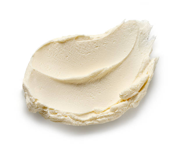 istock fresh cream cheese isolated on white background 2254392662