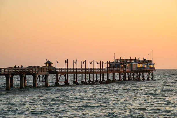 The Swakopmund waterfront in Namibia with the Jetty at sunset