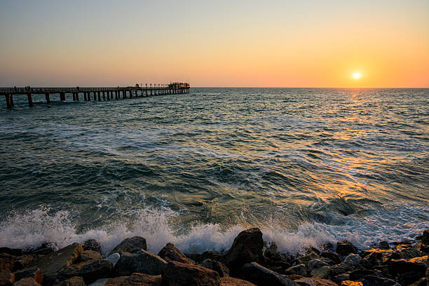 The Swakopmund waterfront in Namibia with the Jetty in the background at sunset