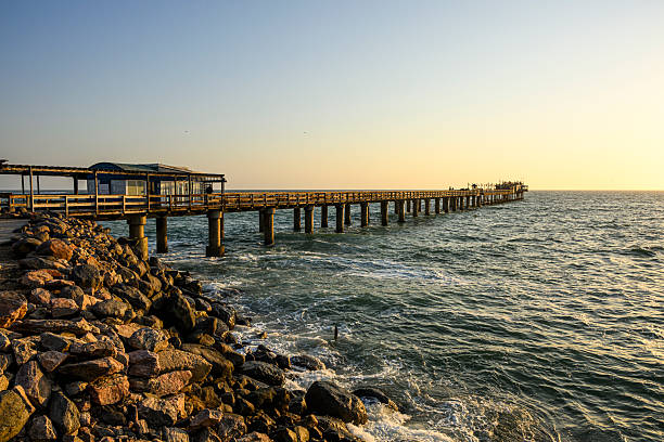 The Swakopmund waterfront in Namibia with the Jetty at sunset