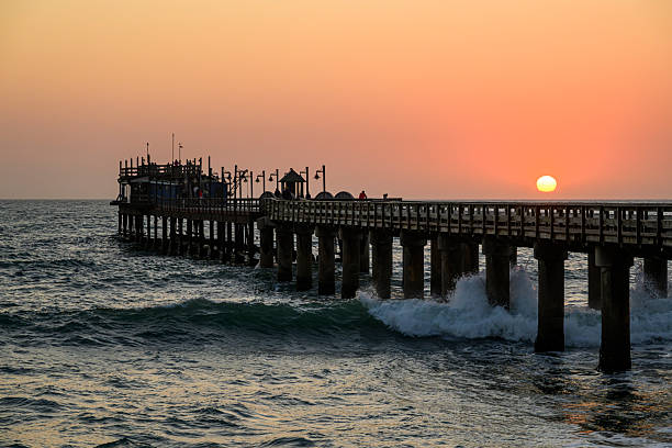 The Swakopmund waterfront in Namibia with the Jetty at sunset