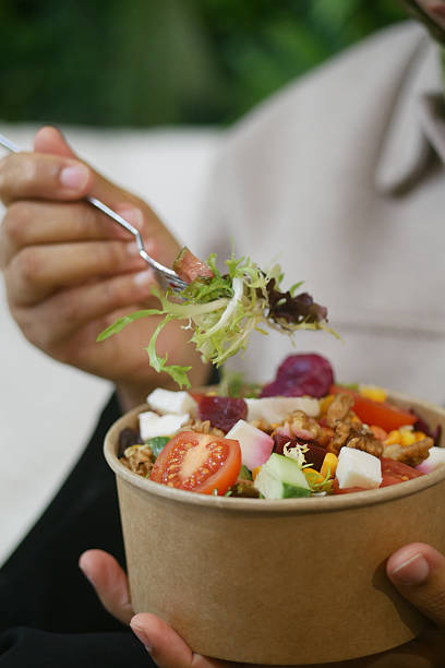 istock Fresh salad served for lunch at a casual dining spot 2254395940
