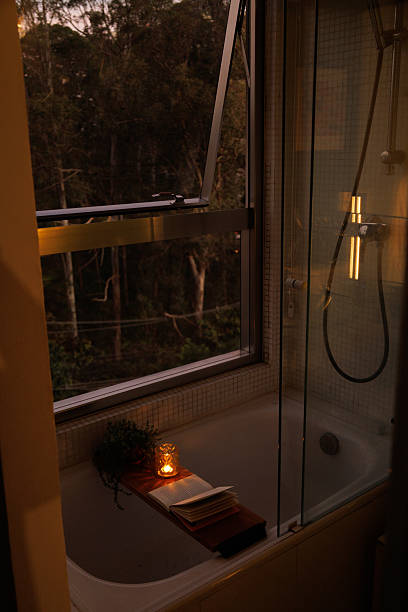istock Chill bathroom bathtub with candle light 2254397751