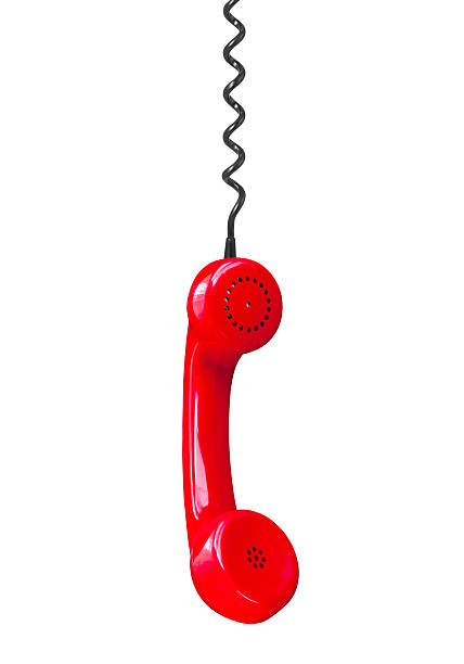 istock Red telephone handset hanging on cable 2254403072