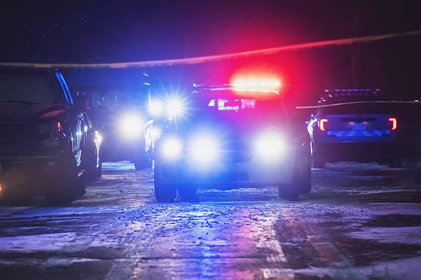 Police officers respond to a crime scene.
