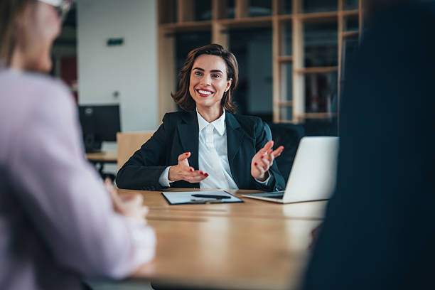 istock Client consultation in modern minimalist office space. Supplier meeting 2254404397