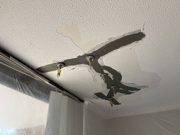 istock A concrete ceiling crack repair is underway using sealed epoxy and pressurised injection nipples to stop water ingress from below 2254405032