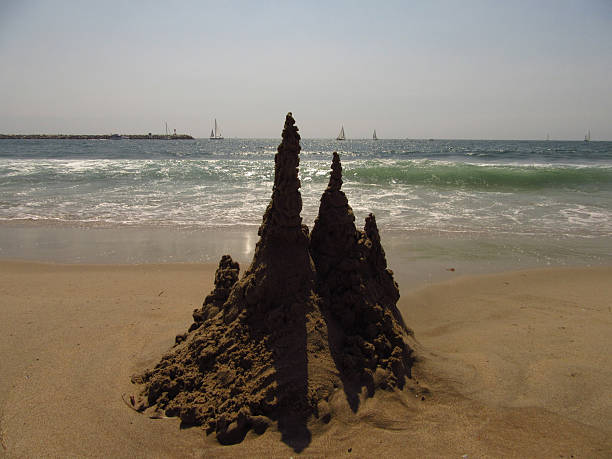 Drip Sandcastle with Distant Sailboats