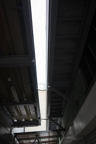 Looking up at the warehouse roof