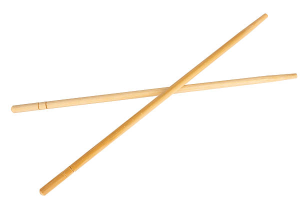 istock wooden chopsticks isolated on a white background 2254407709