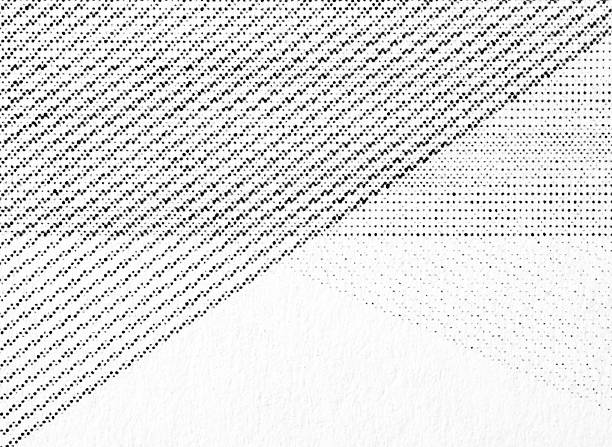 Macro close-up of black halftone dots printed on white paper, showing dense diagonal hatch streaks sweeping across the image and a soft curved arc with fading raster texture and grain.