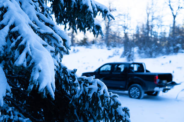 A car covered with snow in winter