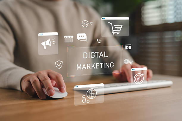 istock Hands using computer with digital marketing icons, representing online advertising, e-commerce, SEO, social media, targeting strategy, content creation and internet marketing for business growth. 2254409789